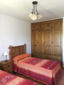 A bed or beds in a room at La Chaparra