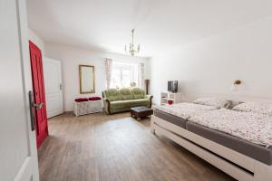 Postel nebo postele na pokoji v ubytování Apartmany Rabi + 29 fotografií