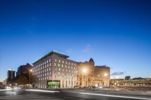 a building on a city street at night at Hotel 3K Europa in Lisbon