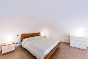 Posteľ alebo postele v izbe v ubytovaní nel Borgo Antico
