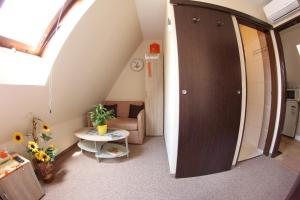 Posedenie v ubytovaní Apartmány Morávka