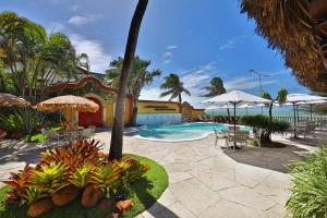 A piscina localizada em Manary Praia Hotel ou nos arredores
