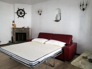 En eller flere senge i et værelse på Casa vacanze Le mura