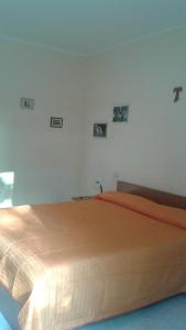 Giường trong phòng chung tại Agriturismo Col Cacione