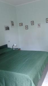 Giường trong phòng chung tại Agriturismo Col Cacione