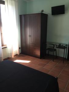 Telewizja i/lub zestaw kina domowego w obiekcie Agriturismo La Farazzina
