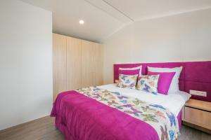 Ένα ή περισσότερα κρεβάτια σε δωμάτιο στο Domek Apartamentowy
