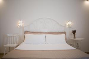 A bed or beds in a room at Nuvole Barocche