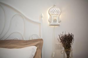 A bed or beds in a room at Nuvole Barocche