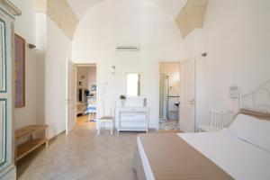 A bed or beds in a room at Nuvole Barocche