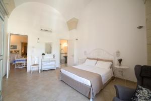 A bed or beds in a room at Nuvole Barocche