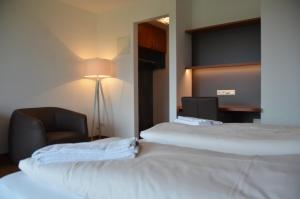 A bed or beds in a room at Kolping Campus Krems