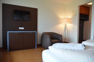 A bed or beds in a room at Kolping Campus Krems