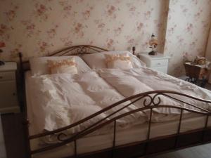 Posteľ alebo postele v izbe v ubytovaní Apartmán Nostalgie