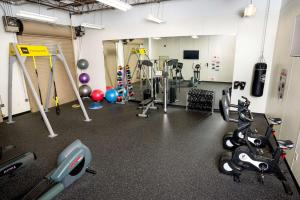 a gym with cardio equipment and exercise bikes in it at Best Western Plus - King of Prussia in King of Prussia