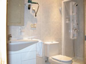 Ванна кімната в Hotel Costa Verde