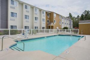 The swimming pool at or close to Microtel Inn & Suites by Wyndham Walterboro