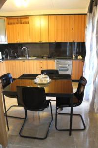 A kitchen or kitchenette at Sea View Villa by Agora