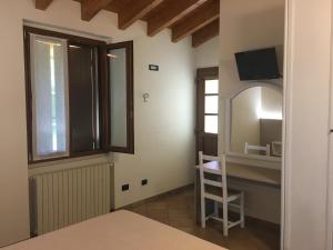 Postel nebo postele na pokoji v ubytování Villa Pasini