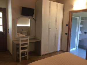 Postel nebo postele na pokoji v ubytování Villa Pasini