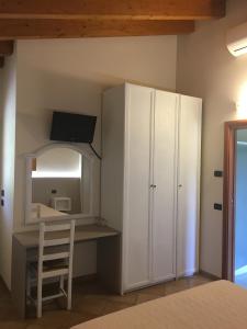 Postel nebo postele na pokoji v ubytování Villa Pasini