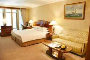 Voodi või voodid majutusasutuse Evergreen Laurel Hotel Taipei toas