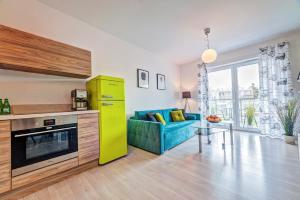 Kuchyňa alebo kuchynka v ubytovaní Apartamenty Homely Place Koziołki - Stary Rynek - Parking
