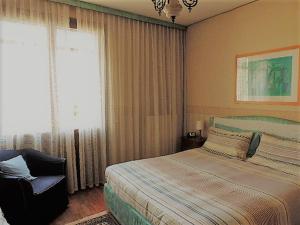 Postel nebo postele na pokoji v ubytování B&B Dora e Flavio Country Rooms