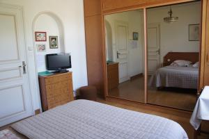 Postel nebo postele na pokoji v ubytování Chez Bernadou