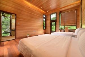 A bed or beds in a room at Spring Garden