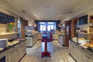 Cucina o angolo cottura di Sonnenhof Genusshotel & Appartements