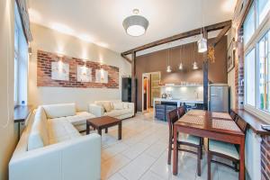Kuchyňa alebo kuchynka v ubytovaní Apartamenty Sun & Snow Willa Perła