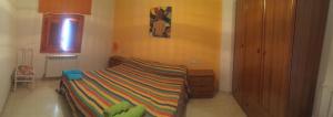A bed or beds in a room at Casa Rural González Montsec Montrebei