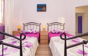 Postel nebo postele na pokoji v ubytování Villa Drinka Apartments + 37 fotografií