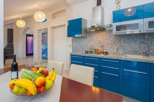 Kuchyň nebo kuchyňský kout v ubytování Villa Drinka Apartments