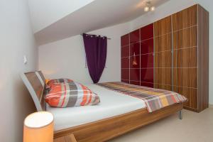 Postel nebo postele na pokoji v ubytování Villa Drinka Apartments