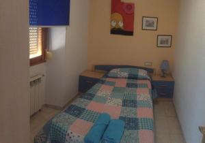 A bed or beds in a room at Casa Rural González Montsec Montrebei