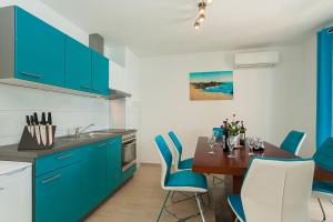 Kuchyň nebo kuchyňský kout v ubytování Villa Drinka Apartments