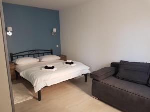 Postel nebo postele na pokoji v ubytování Villa Drinka Apartments
