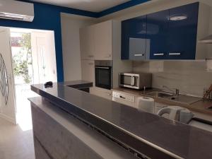 Kuchyň nebo kuchyňský kout v ubytování Villa Drinka Apartments