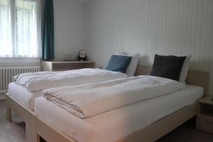 Postel nebo postele na pokoji v ubytování Landgasthof Grossteil