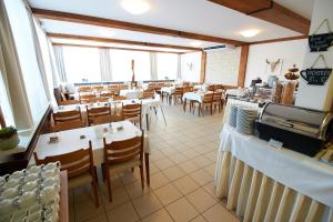 A restaurant or other place to eat at Hotel & Restaurant Seehof