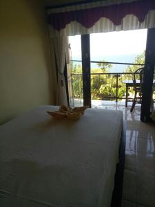 Cama o camas de una habitación en Bintang Homestay and Bungalow's