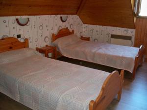 Letto o letti in una camera di Gite Fouga