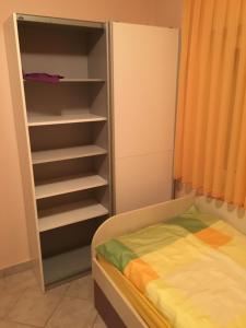 Postel nebo postele na pokoji v ubytování Apartman Petra 1