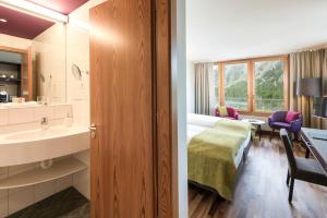 Łóżko lub łóżka w pokoju w obiekcie Hotel Allegra 3 Stern Superior