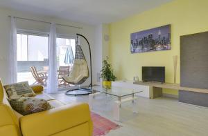 Ein Sitzbereich in der Unterkunft Holiday Home Baldini