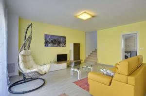 Ein Sitzbereich in der Unterkunft Holiday Home Baldini