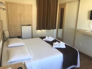 Postel nebo postele na pokoji v ubytování Palace Hotel
