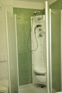 Koupelna v ubytování Hotel Baita Clementi